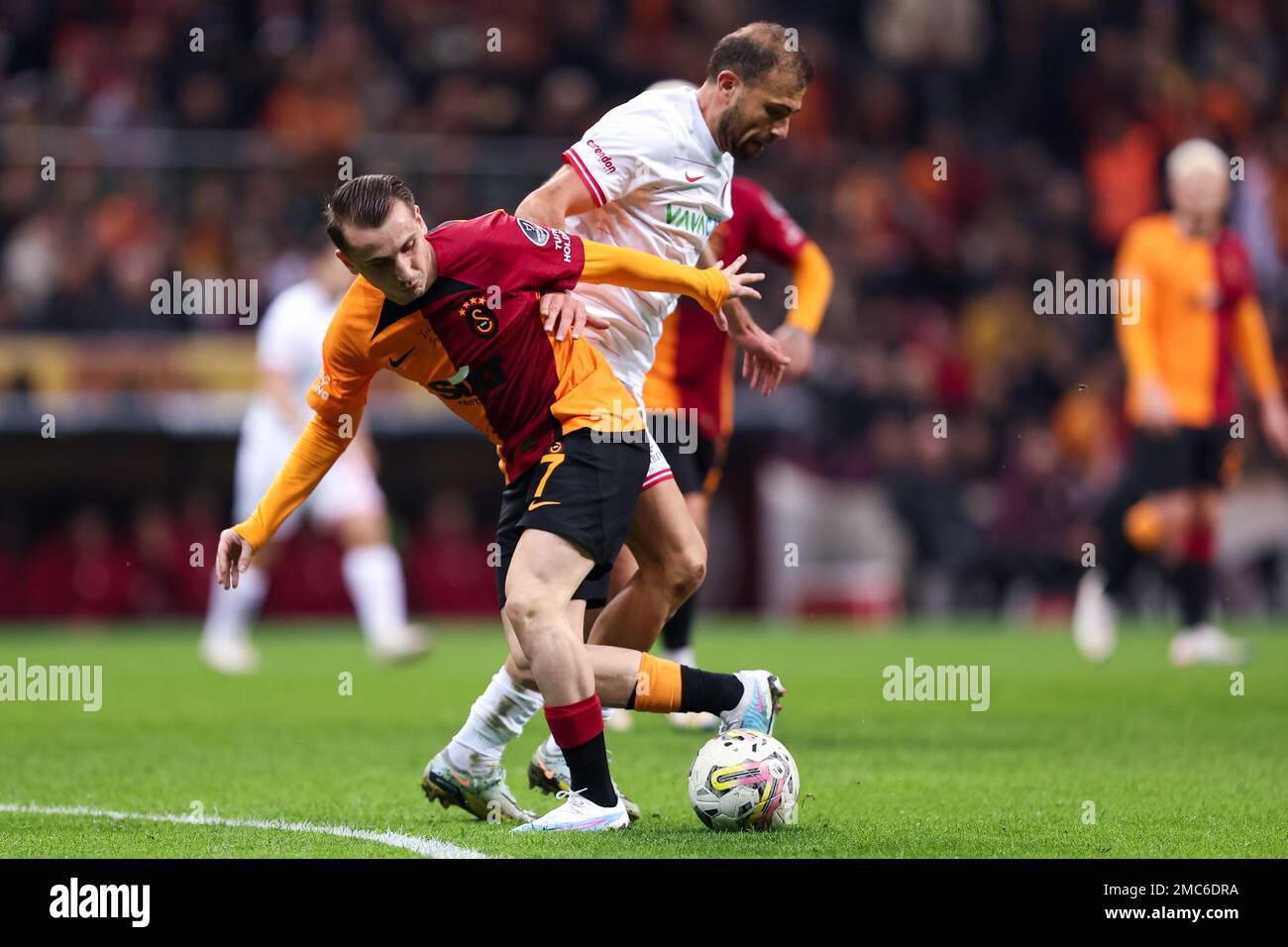 ISTANBUL, TURKEY - JANUARY 21: Kerem Akturkoglu of Galatasaray SK and Admir Mehmedi of Antalyaspor battle for possession during the Super Lig match between Galatasaray SK and Antalyaspor at the NEF Stadium on January 21, 2023 in Istanbul, Turkey (Photo by Orange Pictures) Stock Photo