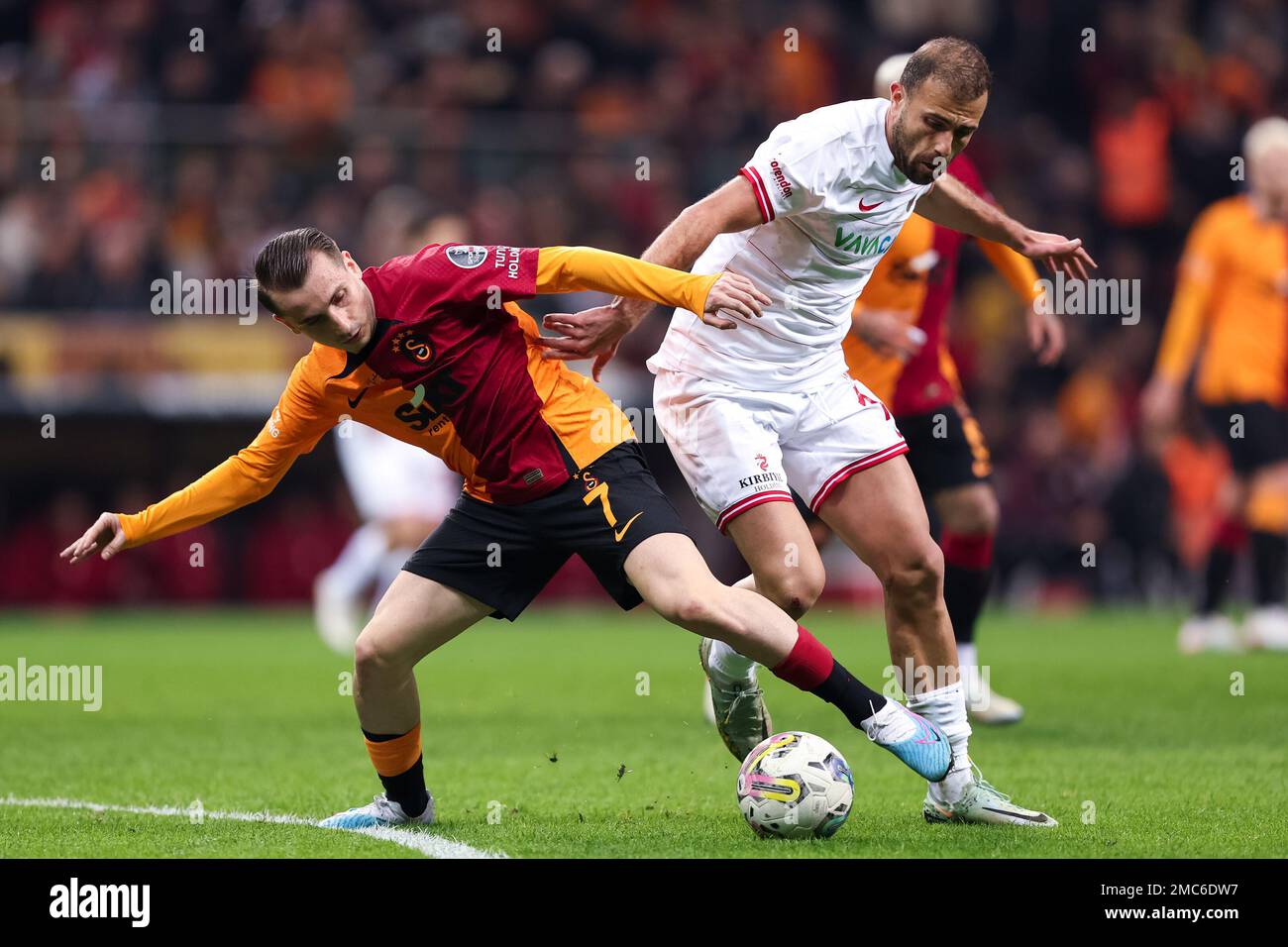 ISTANBUL, TURKEY - JANUARY 21: Kerem Akturkoglu of Galatasaray SK and Admir Mehmedi of Antalyaspor battle for possession during the Super Lig match between Galatasaray SK and Antalyaspor at the NEF Stadium on January 21, 2023 in Istanbul, Turkey (Photo by Orange Pictures) Stock Photo