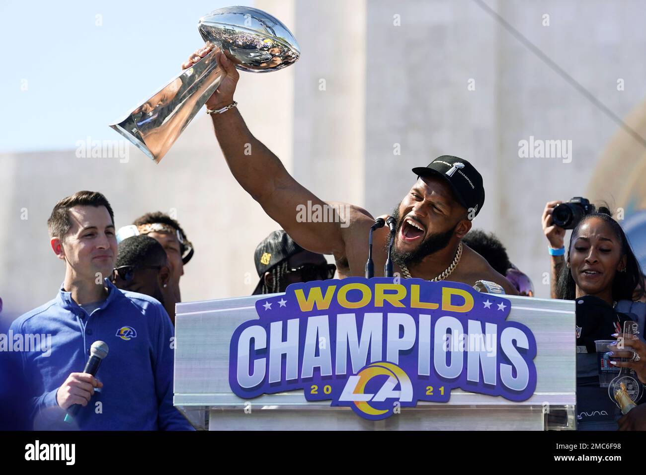 Los Angeles Rams defensive lineman Aaron Donald holds up the Vince Lombardi  Super Bowl trophy during the team's victory celebration and parade in Los  Angeles, Wednesday, Feb. 16, 2022, following the Rams'