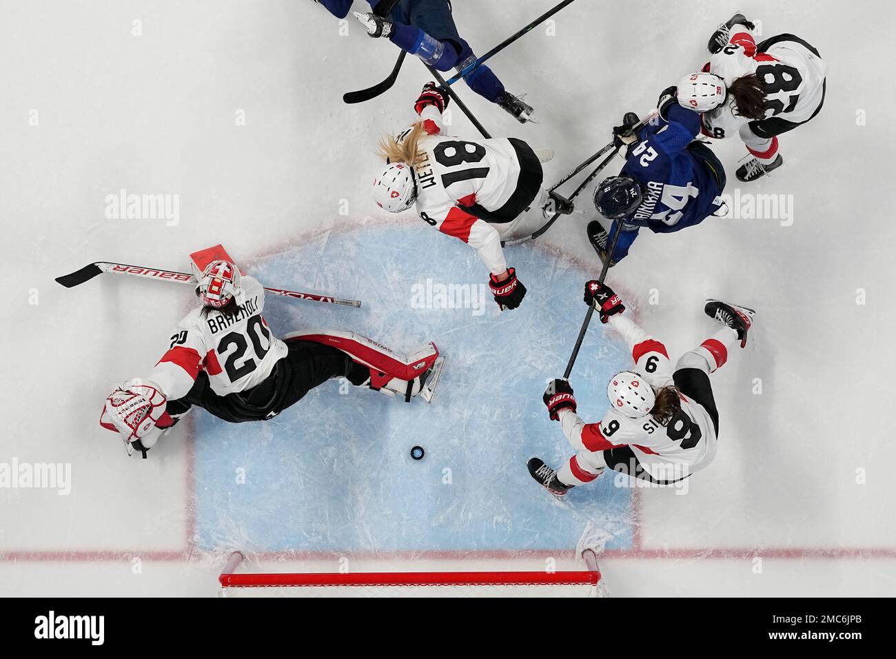 Finland's Viivi Vainikka (24) scores a goal past Switzerland goalkeeper