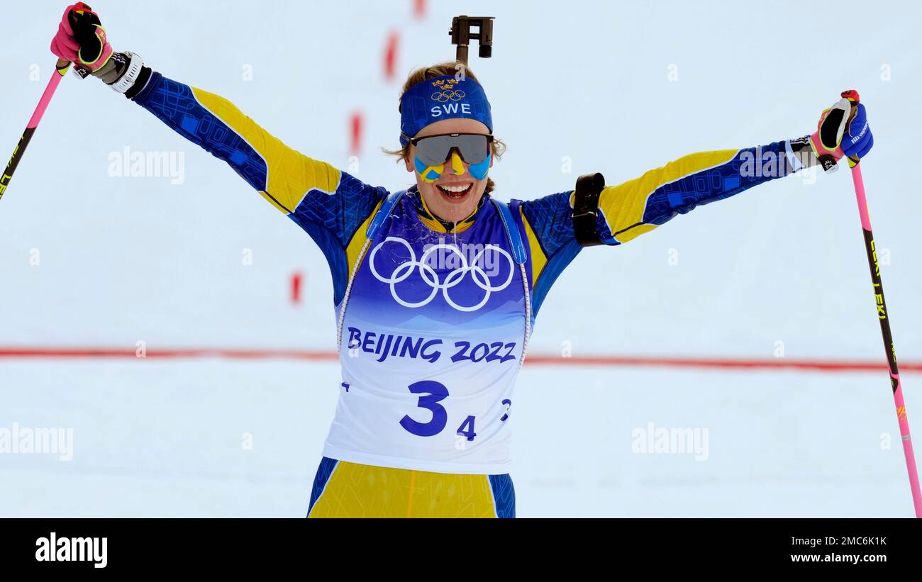 Elvira Oeberg of Sweden crosses the finish line in first during the