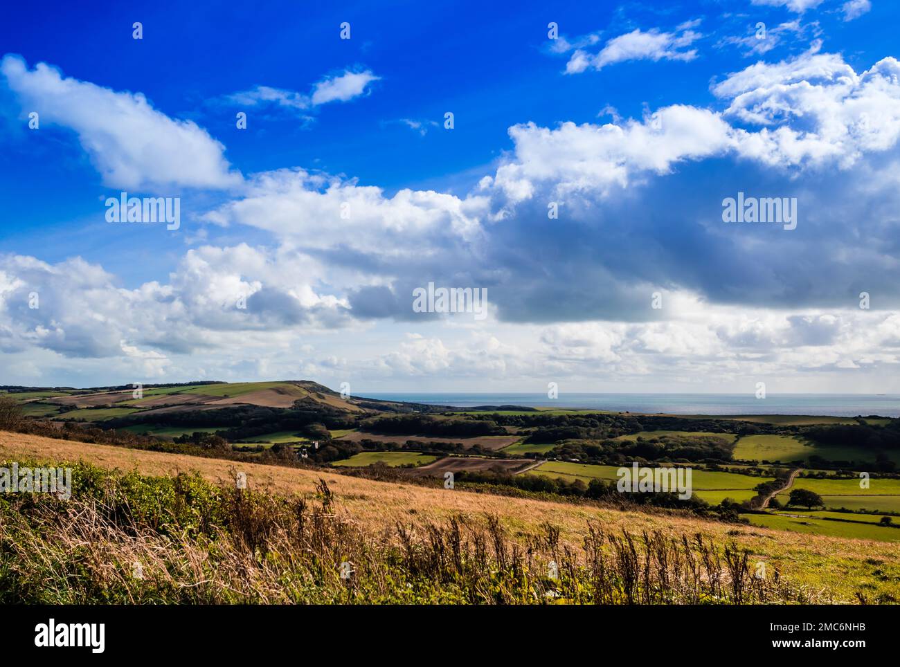 View towards Kimmeridge Bay from the Purbeck hills on a glorious autumn day. Stock Photo