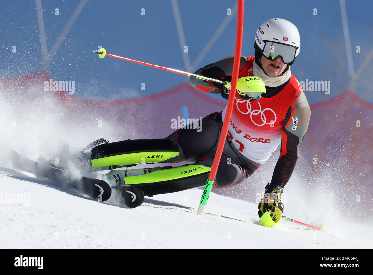 Atle Run Atle Lie Mcgrath, of Norway passes a gate during the first run of the ...