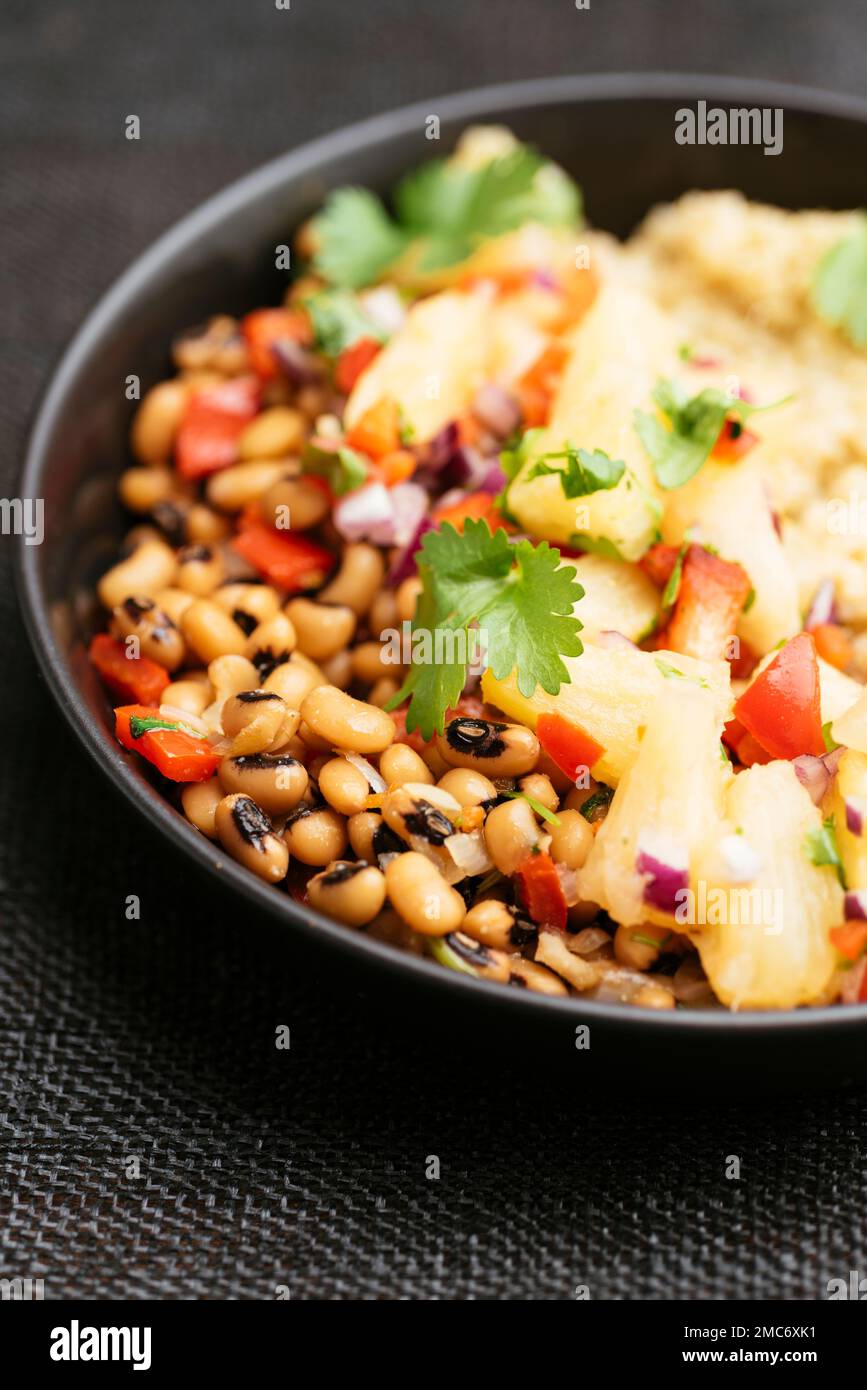 Caribbean Blackeyed Peas and Quinoa, with Pineapple Salsa Stock Photo