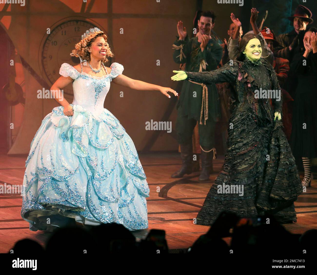 Actors Brittney Johnson, left, and Lindsay Pearce appear on stage during  the curtain call of the musical "Wicked" at the Gershwin Theatre on Monday,  Feb. 14, 2022, in New York. (Photo by