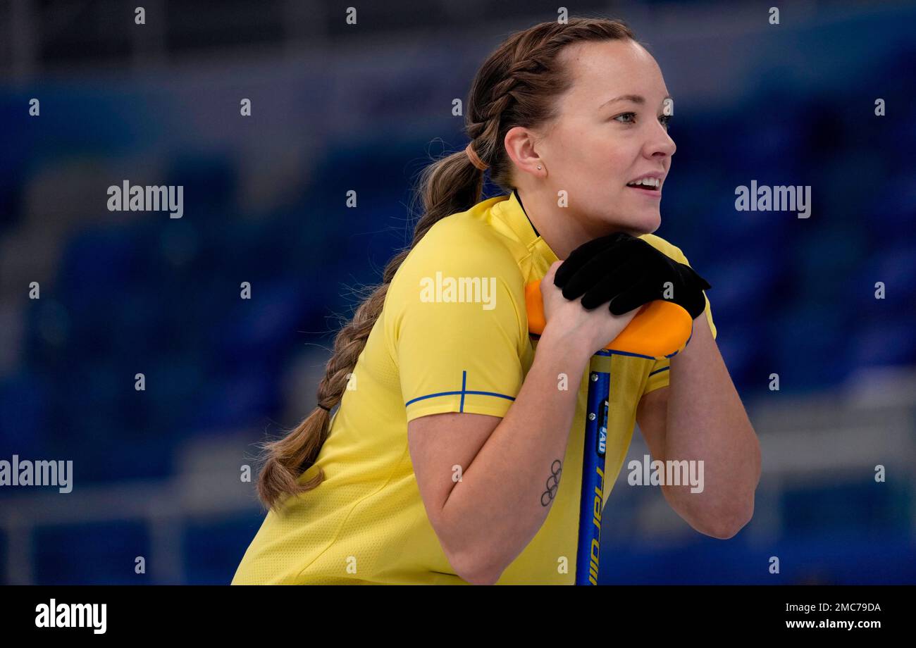 Sweden's Agnes Knochenhauer, listens to her teammate, during the women