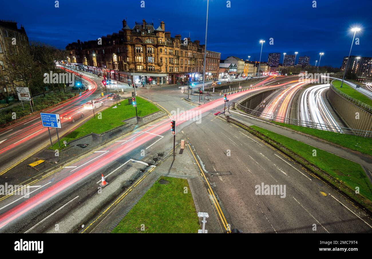 Night pihotograph of Charing Cross Junction in Glasgow Scotland taken at evening rush hour. Stock Photo
