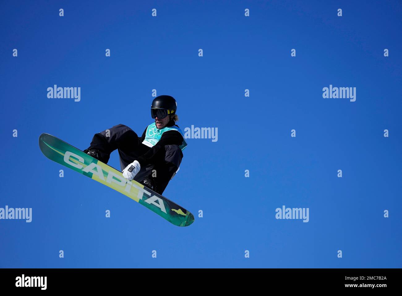 Tiarn Collins of New Zealand competes during the mens snowboard big air qualifications of the 2022 Winter Olympics, Monday, Feb. 14, 2022, in Beijing