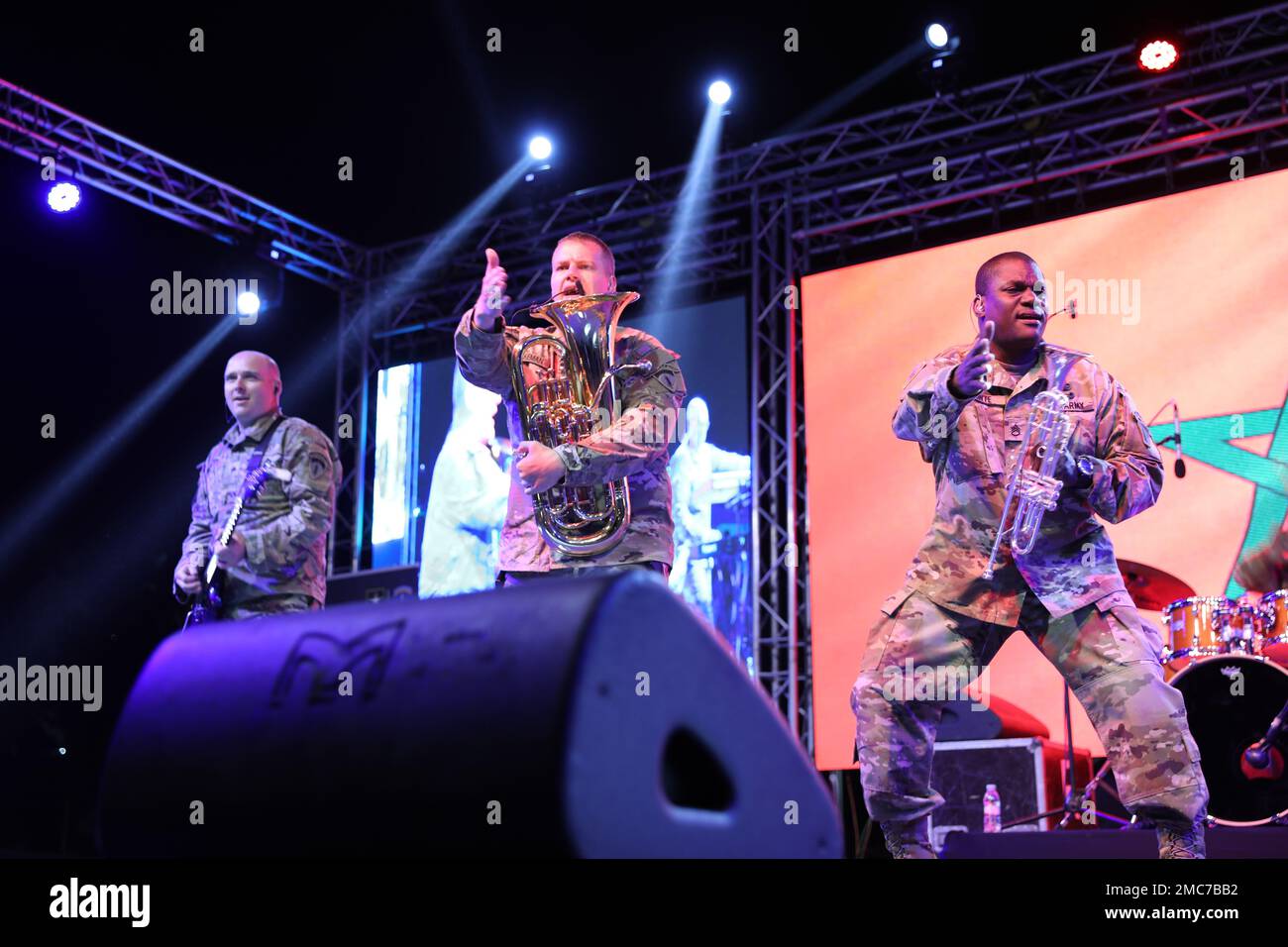 U.S. Army Sgt. Ben Pennington(guitar), U.S. Army Sgt. Benjamin Dykeman (euphonium), and U.S. Army Staff Sgt. Sam Hunte (trumpet), members of Free Groove, U.S. Army Europe and Africa’s premier jazz ensemble, dance on stage in a concert as part of the U.S. Embassy sponsored African Lion 2022 Tour in Agadir, Morocco, June 26, 2022, during African Lion 2022. African Lion 2022 is U.S. Africa Command's largest, premier, joint, annual exercise hosted by Morocco, Ghana, Senegal and Tunisia, June 6 - 30. More than 7,500 participants from 28 nations and NATO train together with a focus on enhancing read Stock Photo