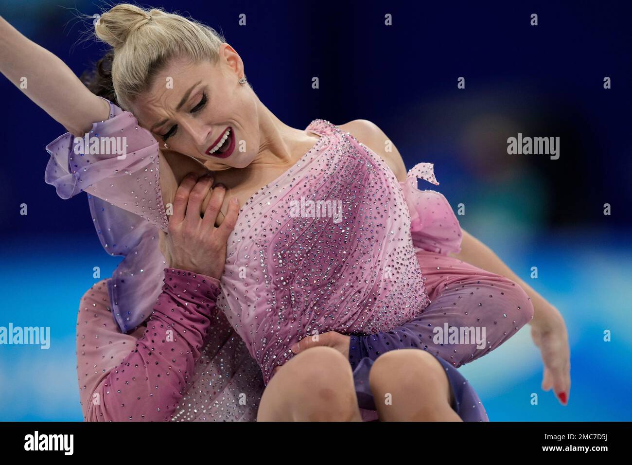 Piper Gilles and Paul Poirier, of Canada, perform their routine in the ice dance competition during the figure skating at the 2022 Winter Olympics, Monday, Feb. 14, 2022, in Beijing. (AP Photo/Bernat Armangue) Stock Photo