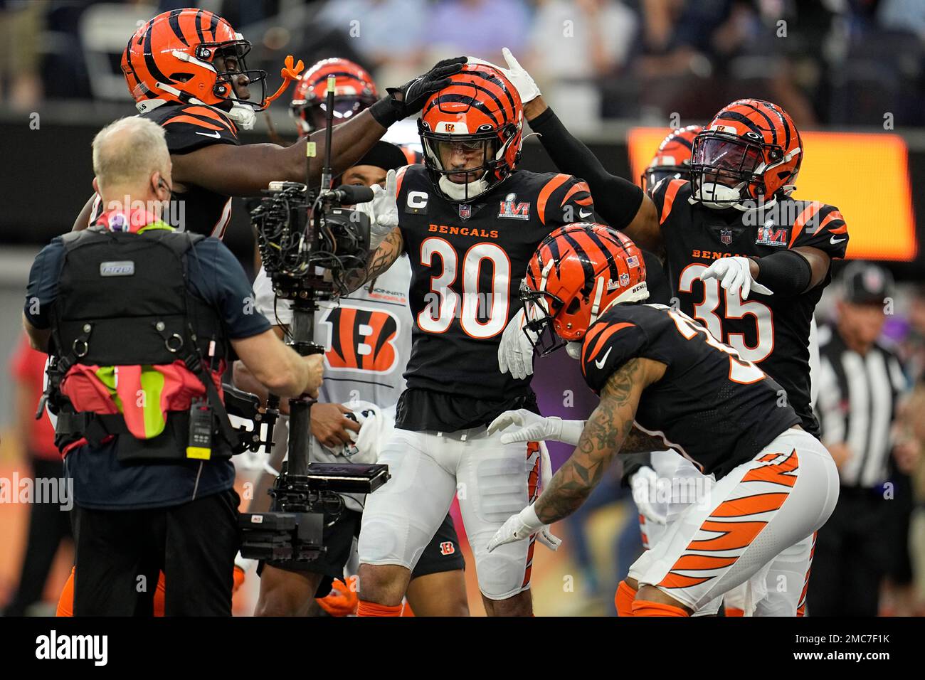 Cincinnati Bengals free safety Jessie Bates III (30) reacts with teammates  after an interception against the Los Angeles Rams during the first half of  the NFL Super Bowl 56 football game Sunday,