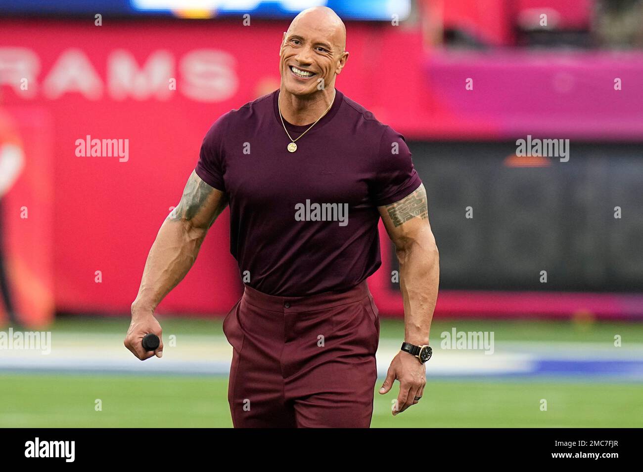 Actor Dwayne Johnson announces the start of the NFL Super Bowl 56 football  game between the Cincinnati Bengals and the Los Angeles Rams Sunday, Feb.  13, 2022, in Inglewood, Calif. (AP Photo/Ted