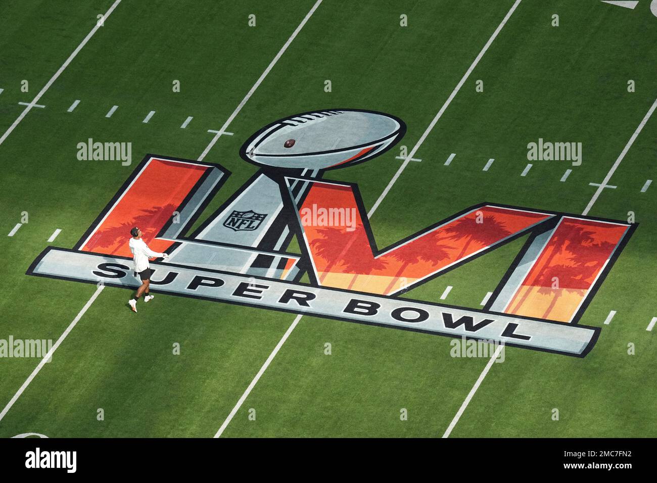 A Cincinnati Bengals player warms up on the field before the NFL Super Bowl  56 football game against the Los Angeles Rams, Sunday, Feb. 13, 2022, in  Inglewood, Calif. (AP Photo/Morry Gash
