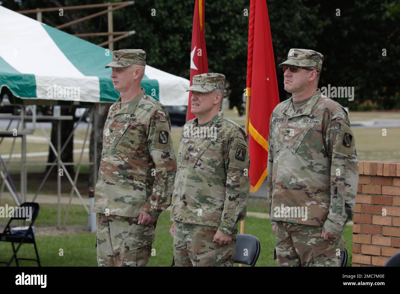 U.S. Army Col. Travis A. Hartman (left) reliquished command of the 359th TTSB to Col. Tracy G. Monteith(right), ceremony was presided over by Major. Gen. John H. Phillips(middle),  commanding general, 335th Signal Command Theater at Barton Field on Fort Gordon in Augusta, GA, June 26, 2022. Stock Photo
