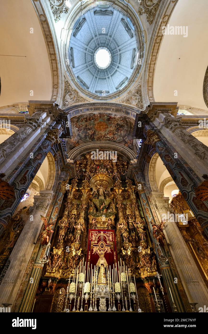 Seville, Spain - December 9, 2021: Church of the Divine Savior interior nave and blue dome. Spanish name of this church is Iglesia Colegial del Divino Stock Photo