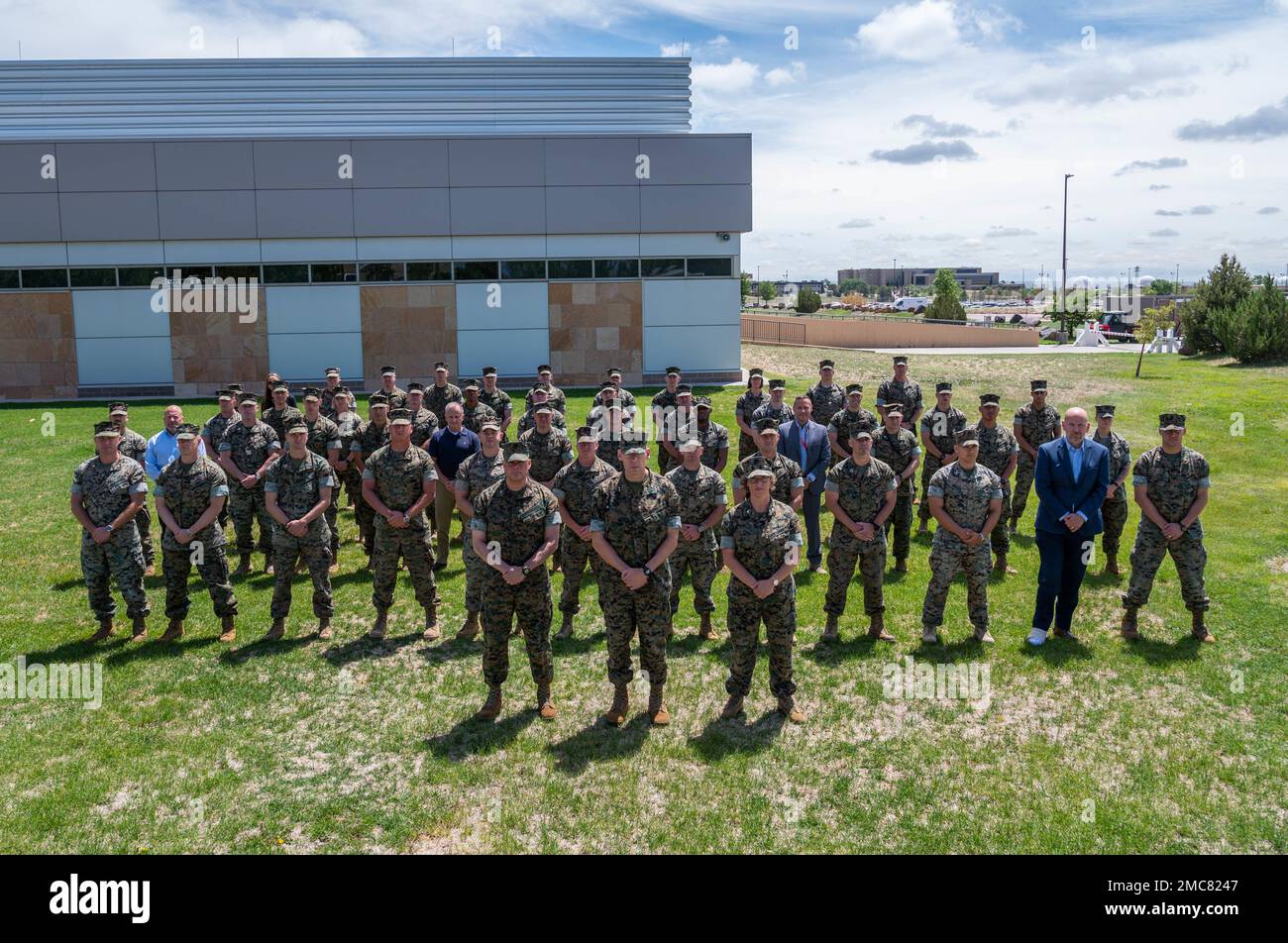 U.S. Marine Corps Maj. Gen. Ryan P. Heritage, Marine Corps Forces Cyberspace Command and Marine Corps Forces Space Command commander, joins action officers from the Marine Corps Space Operational Advisory Group at Schriever Space Force Base, Colo., June 27, 2022. Group participants received information on U.S. Navy and U.S. Marine Corps requirements collection mechanisms currently utilized as well as discussed current and anticipated needs, and establish a preliminary process for periodic collection of future needs aiding in rapidly advancing the capacity and capability of joint force space sy Stock Photo