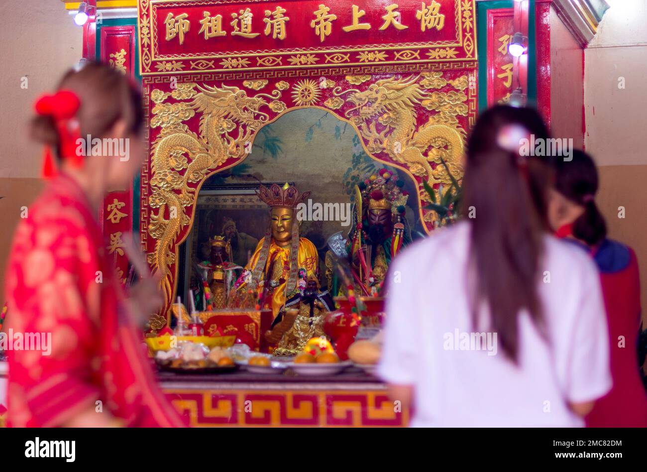 People are seen praying during the Lunar New Year celebration at Guan ...