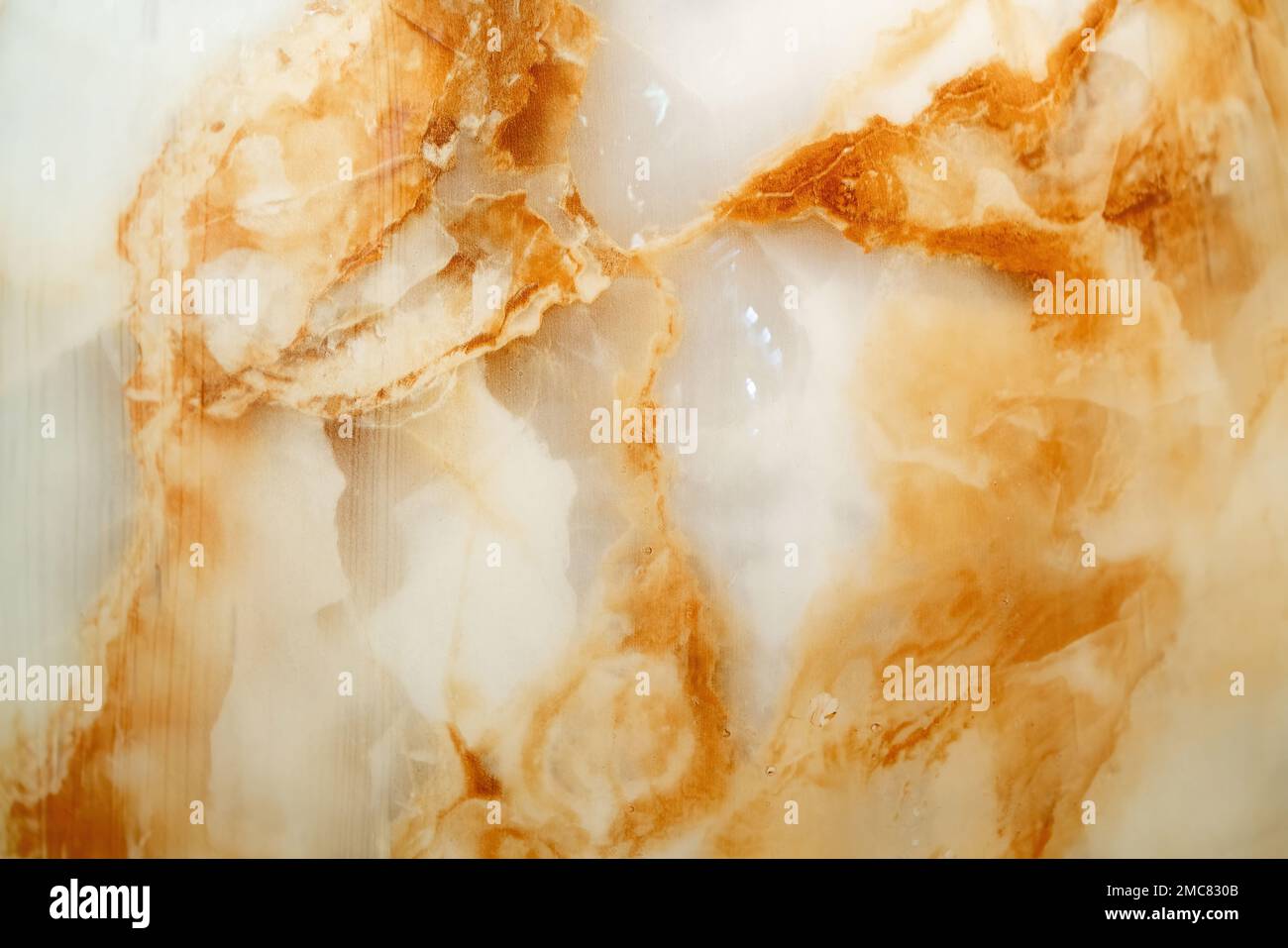 Marble surface pattern, yellow brown marble surface. Blurred pattern Stock Photo