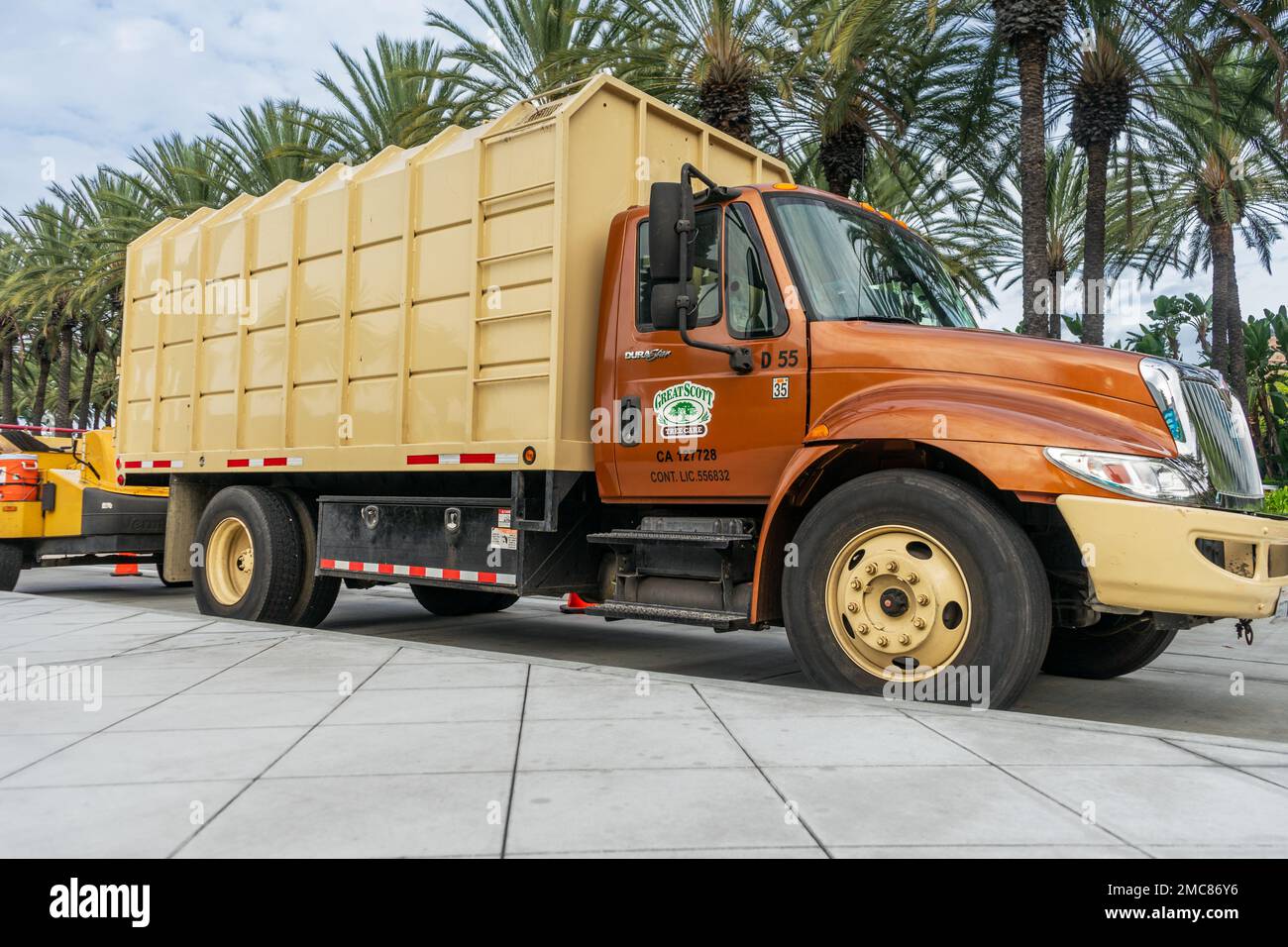 Anaheim, CA, USA – November 1, 2022: Great Scott Tree Service chipper truck servicing the resort district in Anaheim, California. Stock Photo