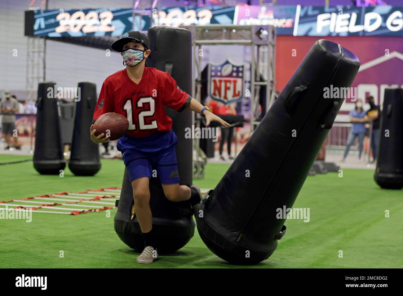 Fans explore the NFL Super Bowl Experience on Thursday, Feb. 10, 2022, in  Los Angeles. (Adam Hunger/AP Images for NFL Stock Photo - Alamy