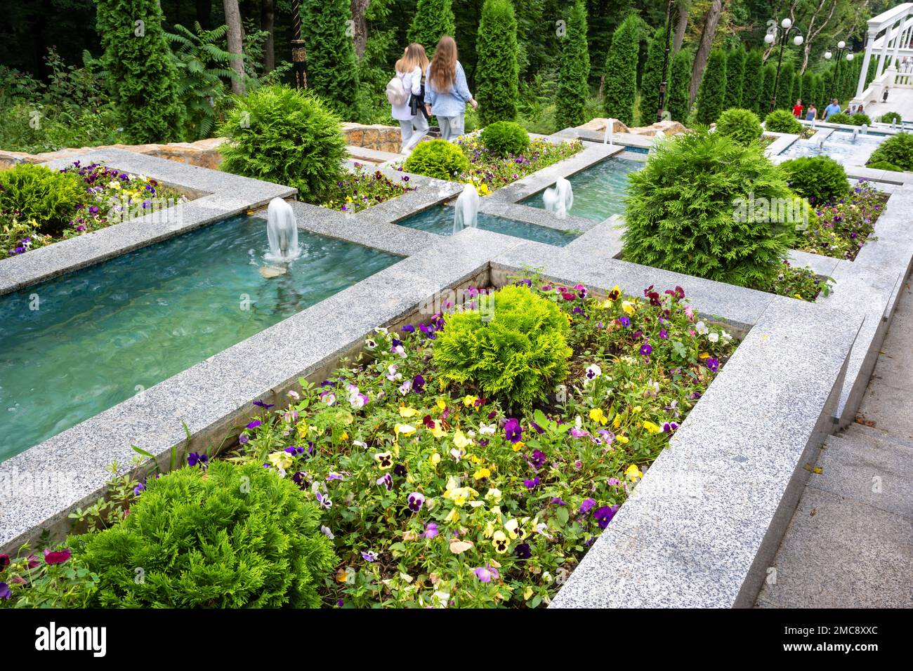 Cascade Stairs in summer, Stavropol Krai, Zheleznovodsk, Russia. Beautiful landscaped staircase with fountains, flowers and plants, landmark of Zhelez Stock Photo