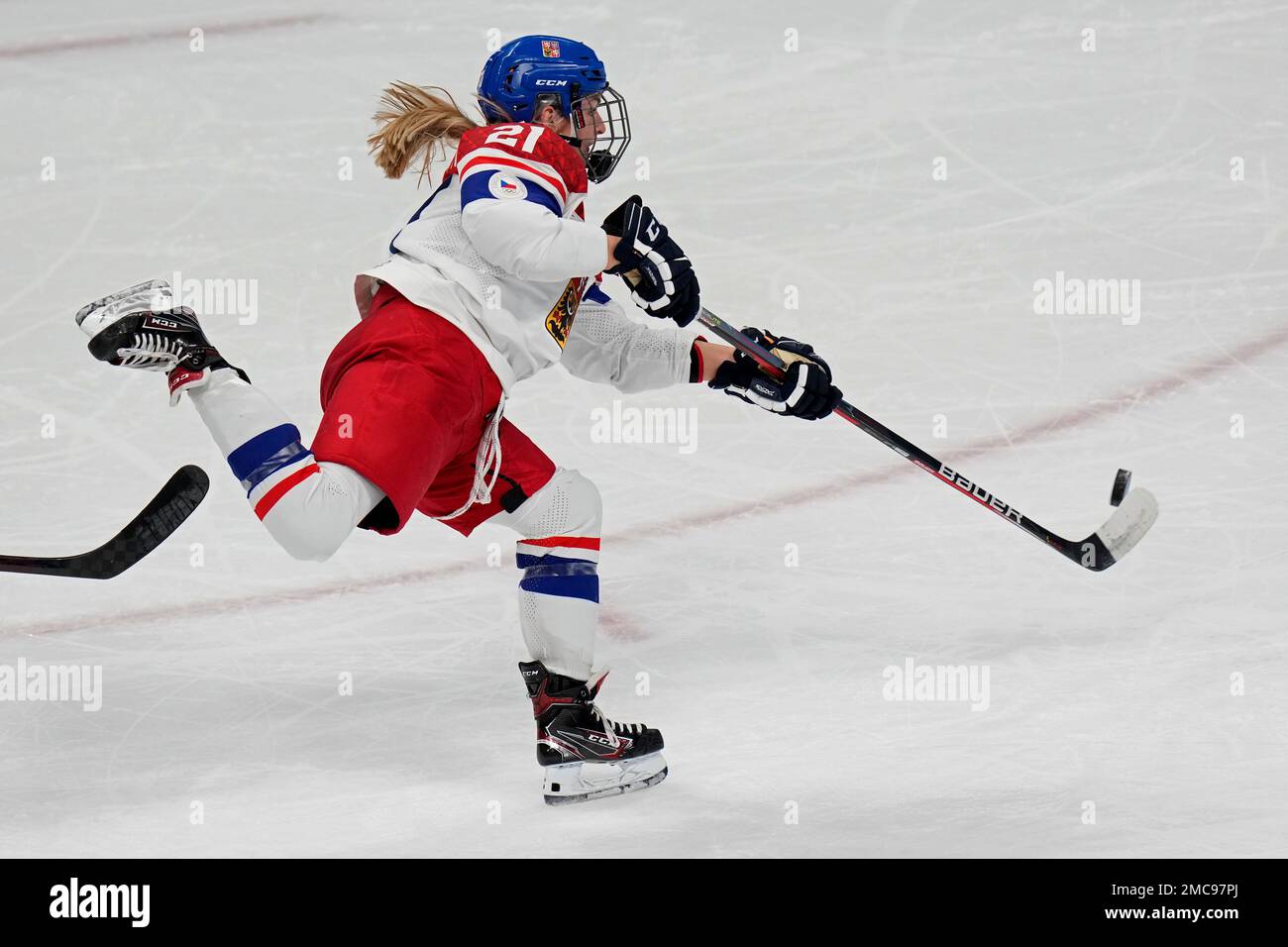Czech Republic's Tereza Vanisova (21) takes a shot against Japan during a  preliminary round women's hockey game at the 2022 Winter Olympics, Tuesday,  Feb. 8, 2022, in Beijing. (AP Photo/Petr David Josek