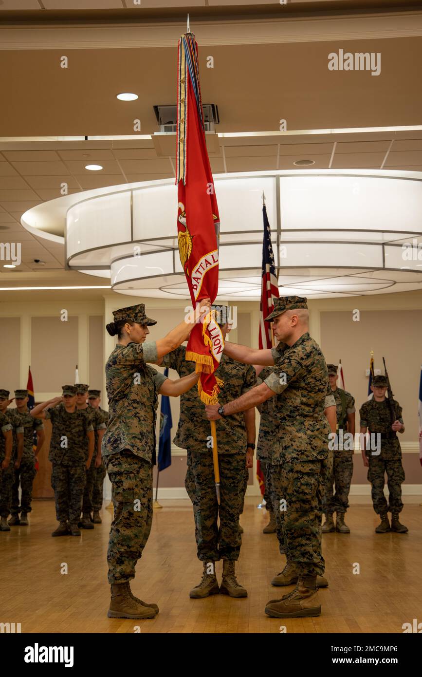 U.S. Marine Corps Lt. Col. Jeffery L. Starr, the outgoing commanding officer of 2d Intelligence Battalion, II MEF Information Group, relinquishes the unit’s guidon to Lt. Col. Ruth E. Kehoe, the oncoming commanding officer of 2d Intel Bn. during a change of command ceremony at Marine Corps Base Camp Lejeune, North Carolina, June 28, 2022. During the ceremony the outgoing commander passes the unit’s guidon to the oncoming commander, symbolizing the transfer of authority, responsibility, and total commitment to all Marines and Sailors. Stock Photo