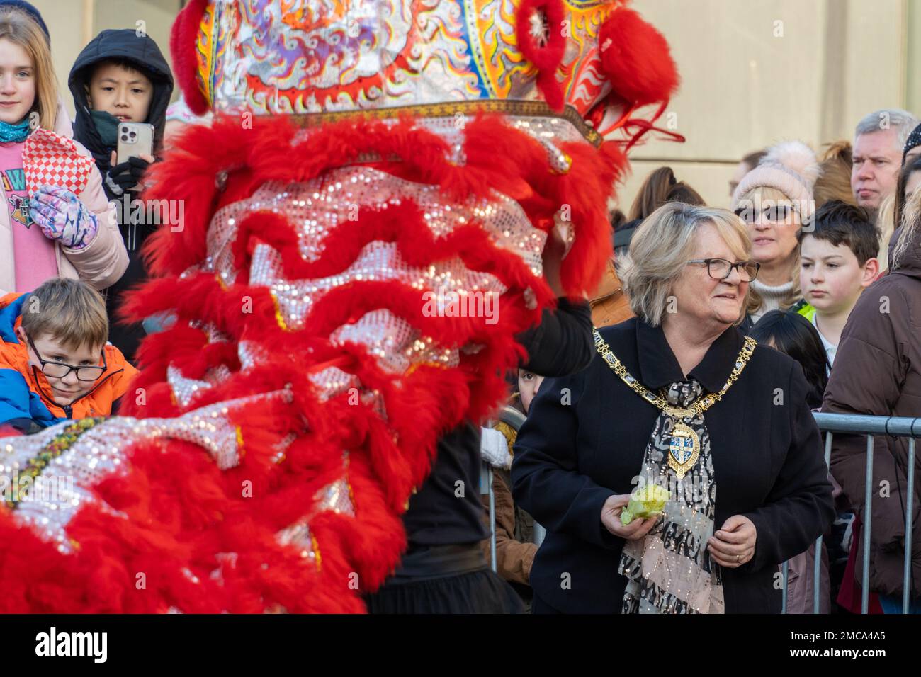 Durham, County Durham, UK. January 21st, 2023. Lunar New Year celebrations in the Year of the Rabbit. People gathered in the city centre to watch performances , including a traditional Chinese lion dance. The Durham County Council Chairman, Councillor Beaty Bainbridge was present, carrying out ceremonial duties. Credit: Hazel Plater/Alamy Live News Stock Photo