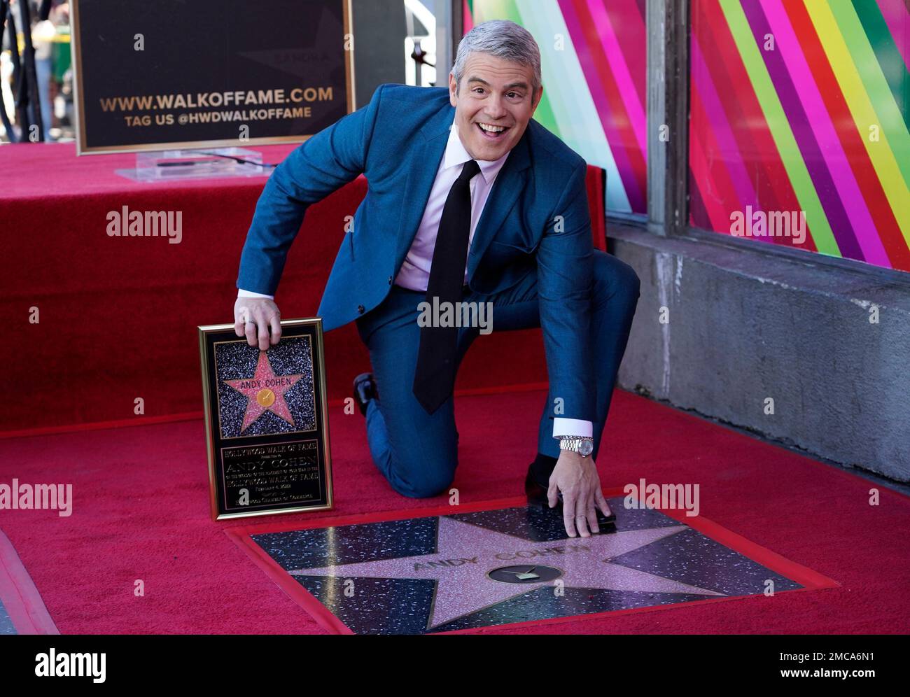 Talk show host Andy Cohen poses with his new star on the Hollywood Walk ...