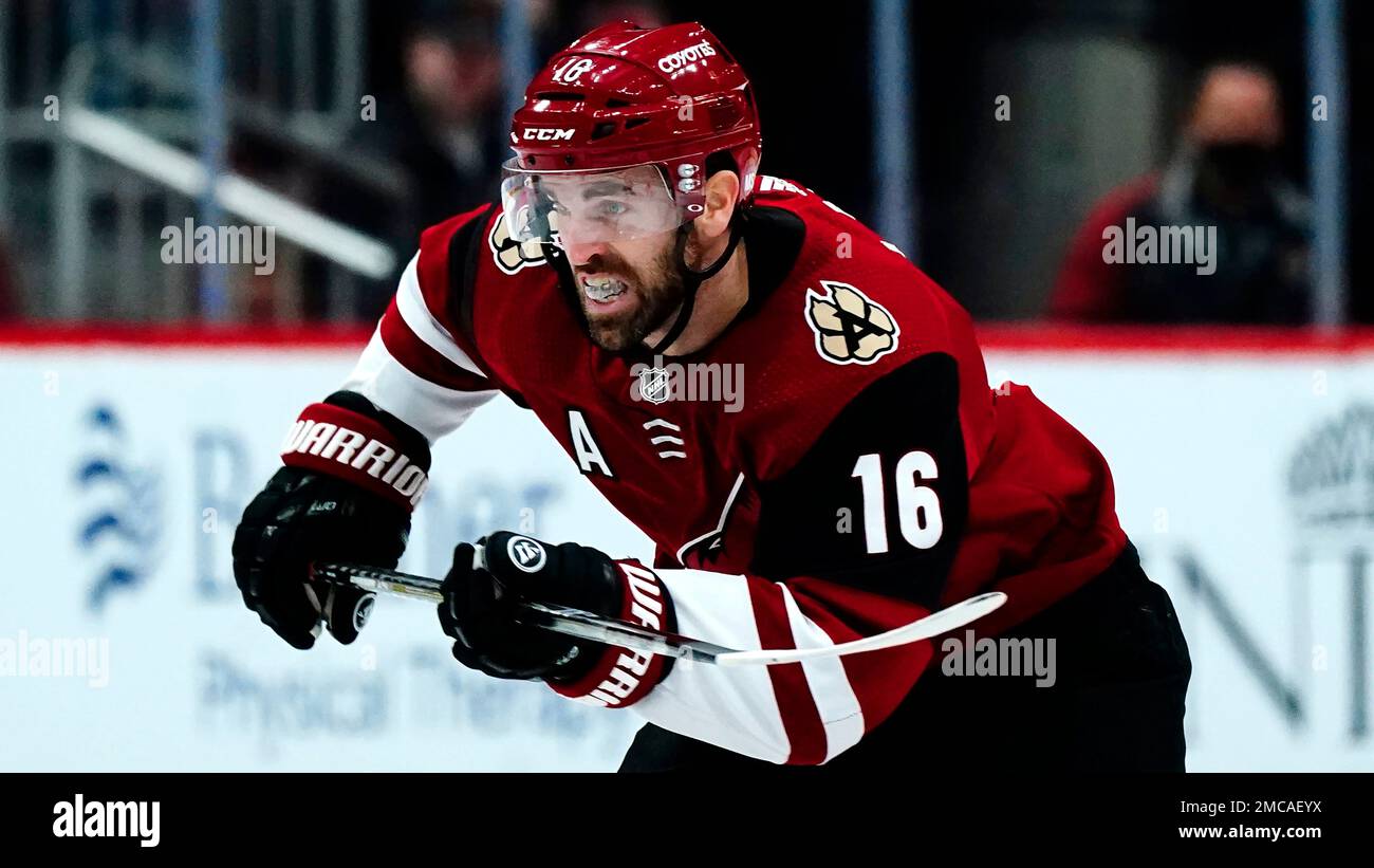Arizona Coyotes left wing Andrew Ladd skates to the puck against the  Calgary Flames during the second period of an NHL hockey game Wednesday,  Feb. 2, 2022, in Glendale, Ariz. (AP Photo/Ross