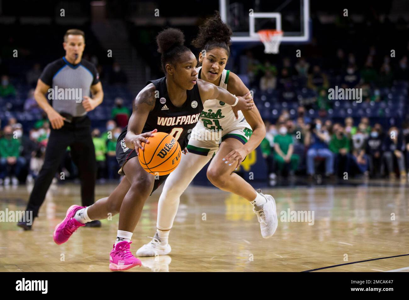 North Carolina State's Diamond Johnson (0) drives around Notre Dame's
