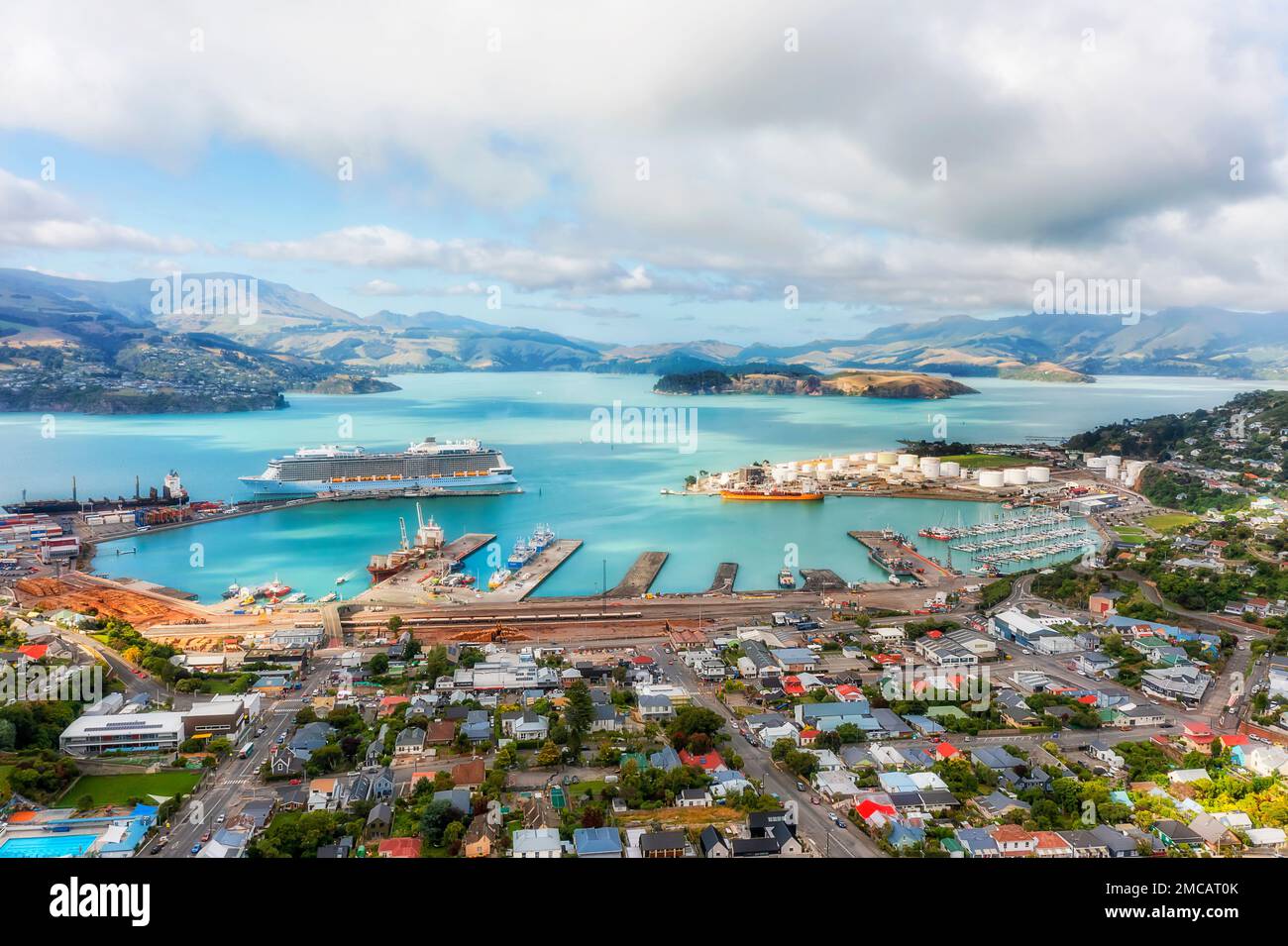 Industrial port, passenger and cargo terminal in Lyttleton town harbour on Pacific coast of New Zealand near Christchurch. Stock Photo
