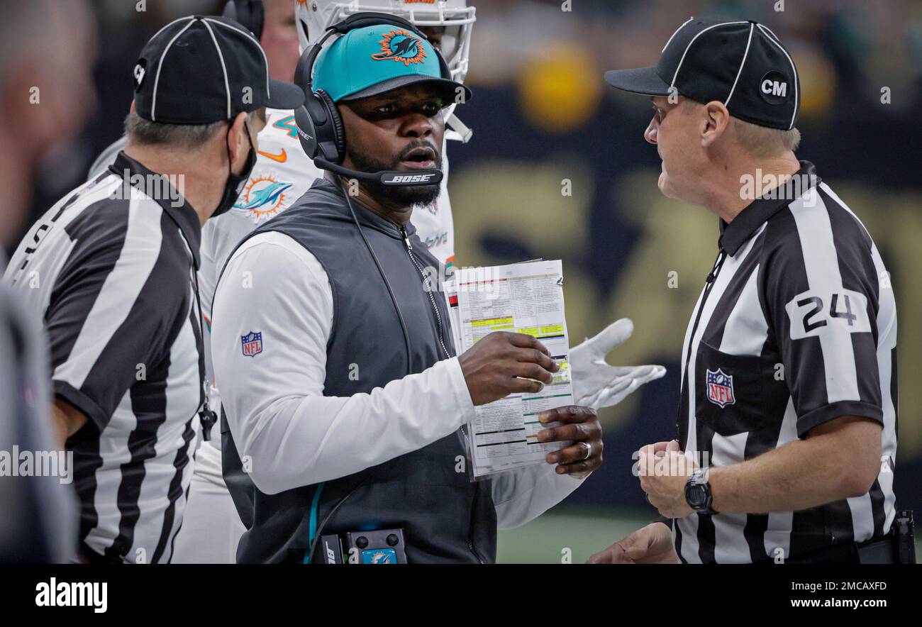 Down judge David Oliver (24) watches a replay on the video board during an  NFL football game between the Philadelphia Eagles and the Tampa Bay  Buccaneers, Monday, Sept. 25, 2023, in Tampa