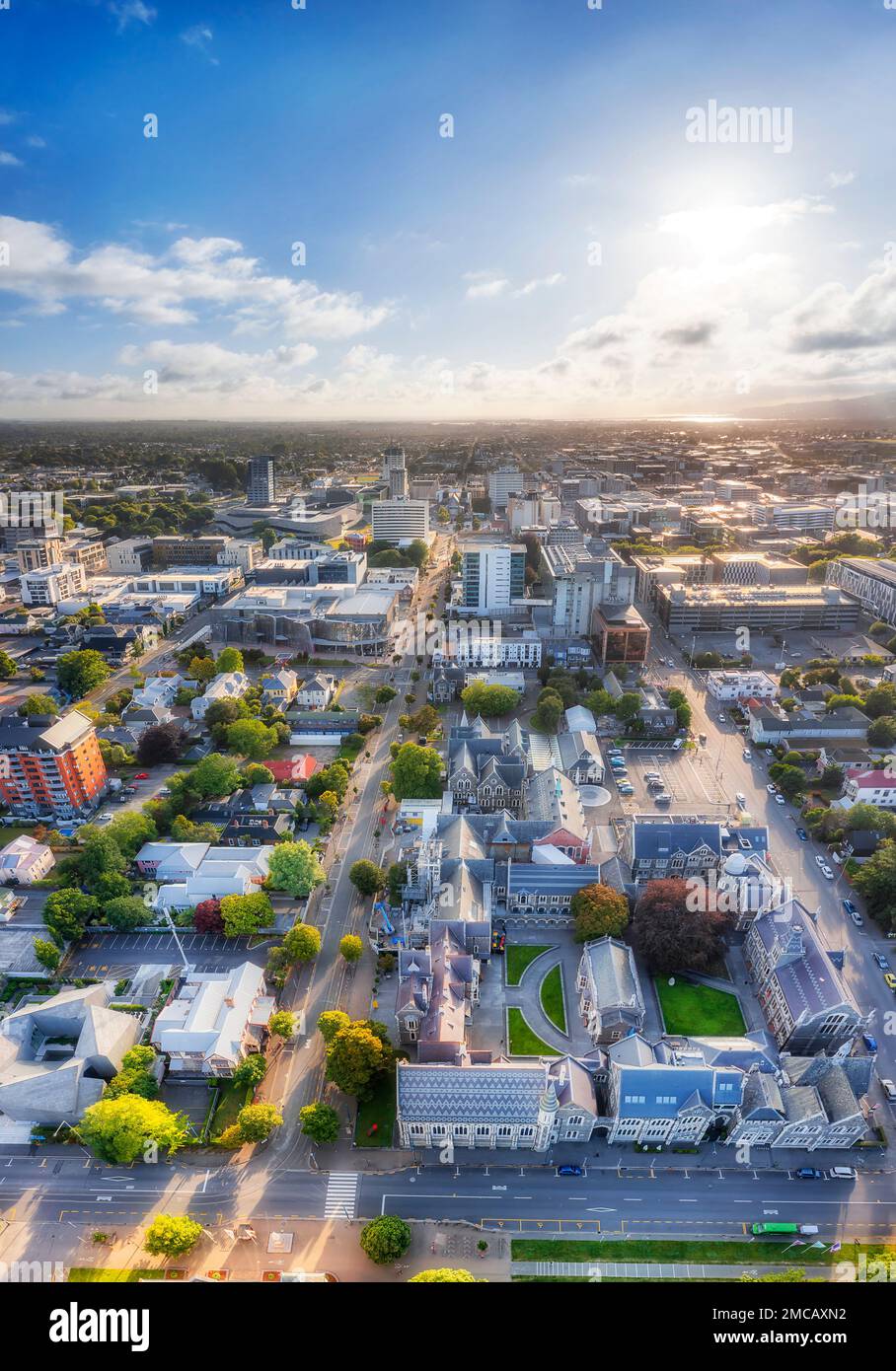 Scenic aerial urban vertical panorama over Christchurch central city downtown streets and buildings from arts precinct to sky. Stock Photo