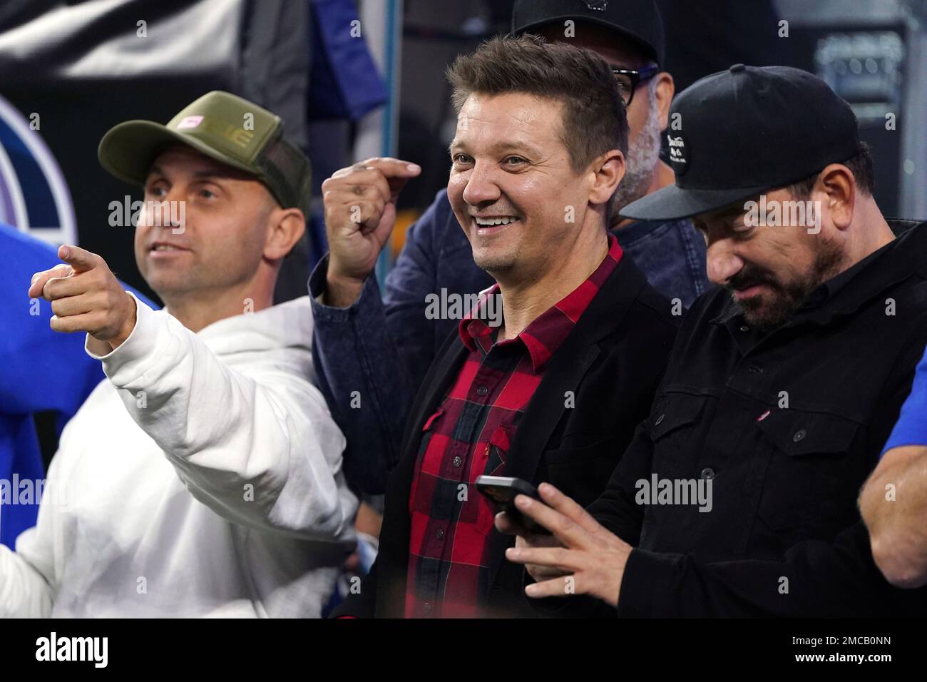 Actor Jeremy Renner watches the Los Angeles Rams take on the San Francisco  49ers during the NFL NFC Championship game, Sunday, Jan. 30, 2022 in  Inglewood, Calif. The Rams defeated the 49ers