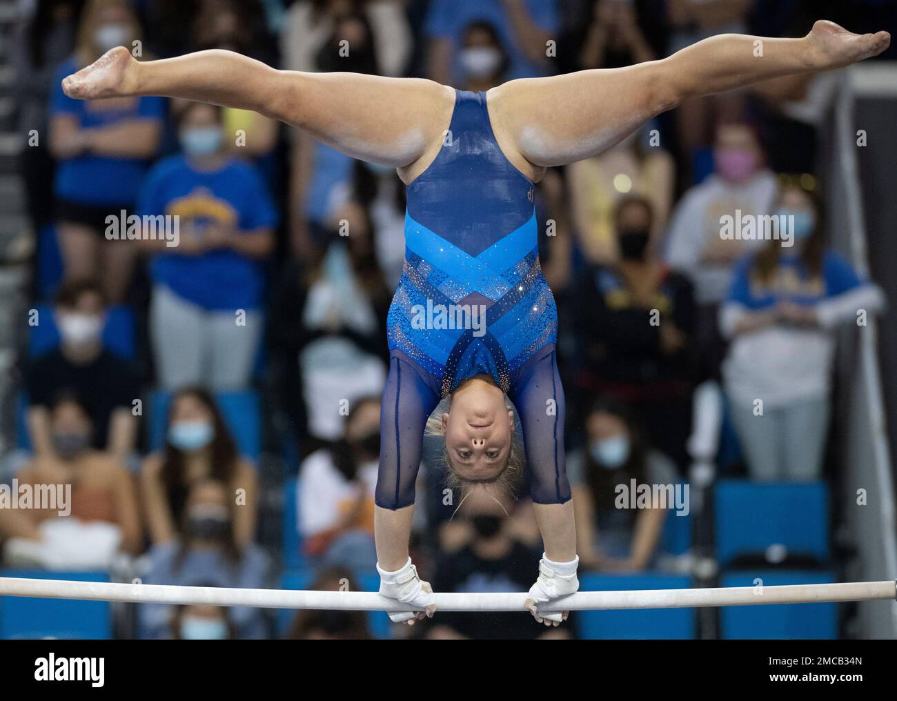 UCLA's Ana Padurariu on the uneven parallel bars during an NCAA