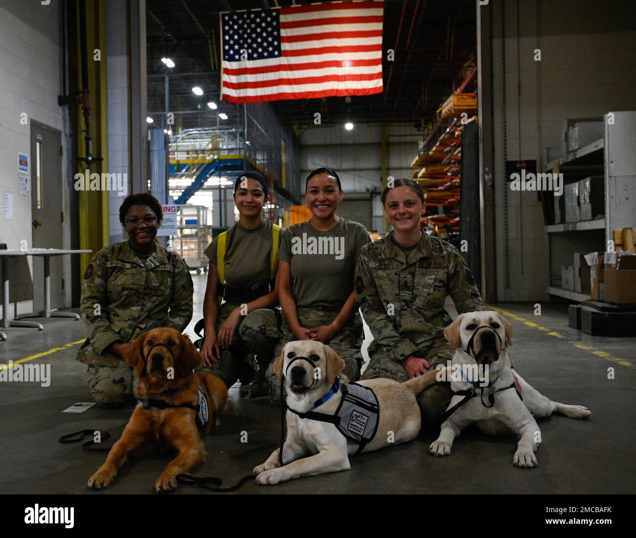 Airmen with the 509th Logistic Readiness Squadron sit for a photo with ...