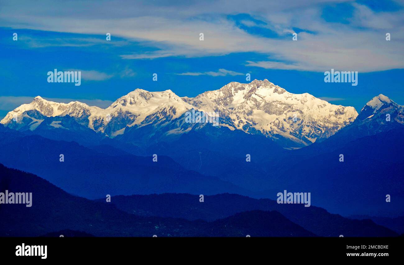 A beautiful range of snowy mountains under the blue sky Stock Photo Alamy