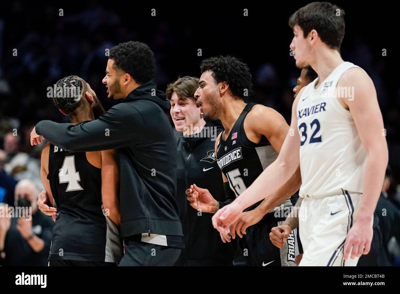 Providence Friars guard Jared Bynum (4) celebrates with teammates after