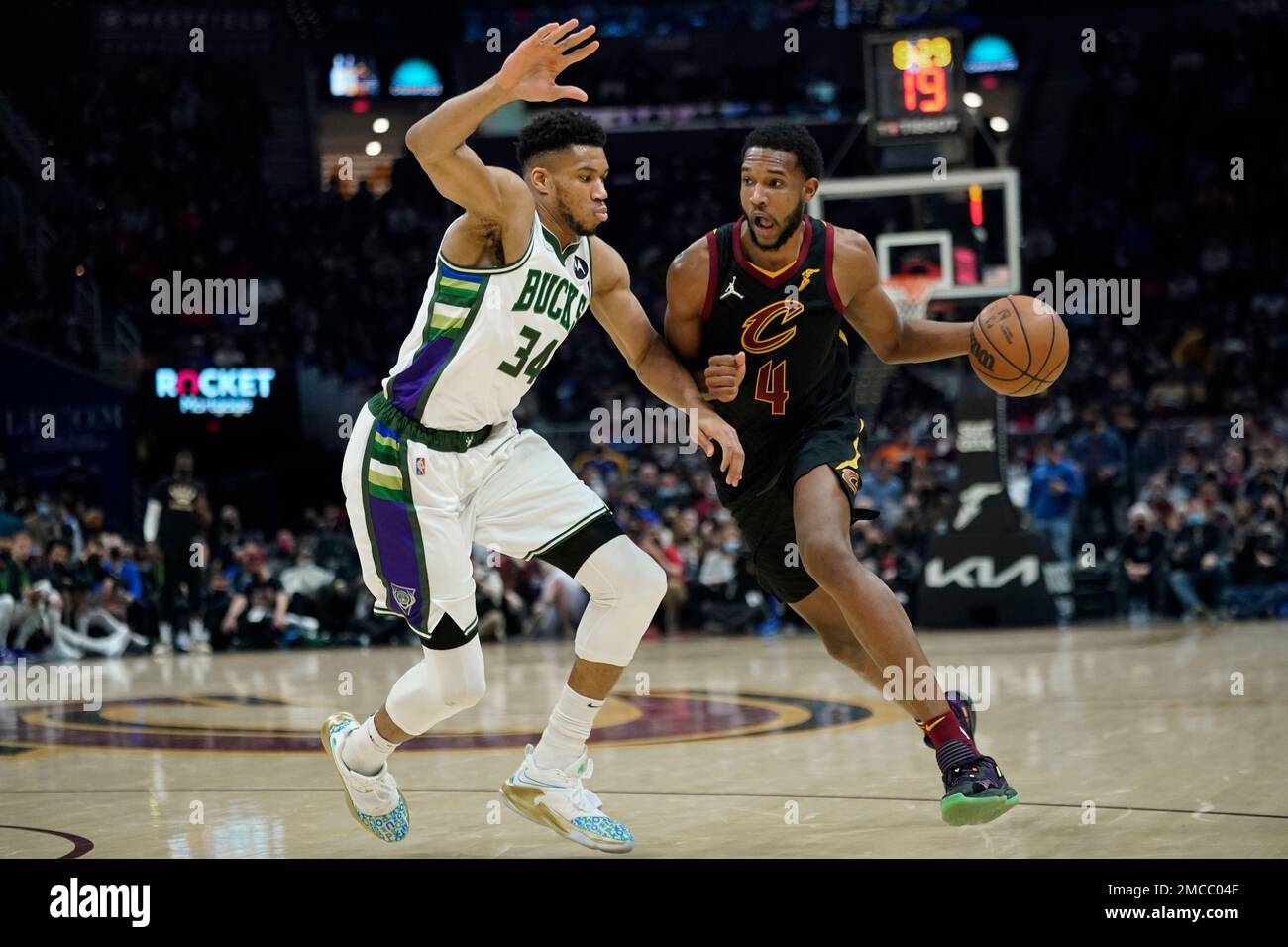 Cleveland Cavaliers' Evan Mobley (4) drives against Oklahoma City Thunder's Darius  Bazley (7) in the first half of an NBA basketball game, Saturday, Jan. 22,  2022, in Cleveland. (AP Photo/Tony Dejak Stock Photo - Alamy