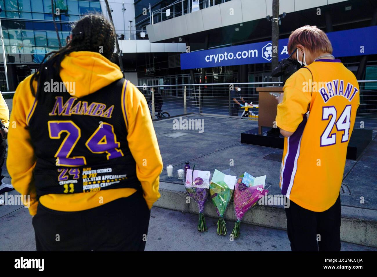 Fans gather outside Crypto.com Arena to honor former Los Angeles Lakers NBA  basketball player Kobe Bryant and his daughter, Gianna, on Wednesday, Jan.  26, 2022, in Los Angeles, Calif. Bryant, his daughter,