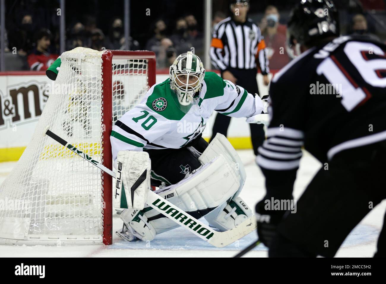 Dallas Stars goaltender Braden Holtby (70) looks on against the New Jersey  Devils during the second period of an NHL hockey game Tuesday, Jan. 25, 2022,  in Newark, N.J. (AP Photo/Adam Hunger