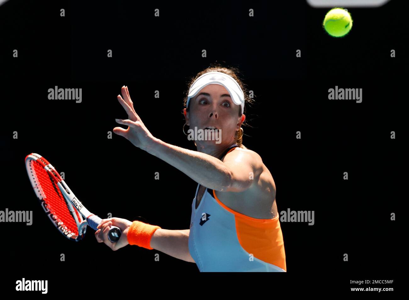Alize of France plays a forehand return to Danielle Collins of