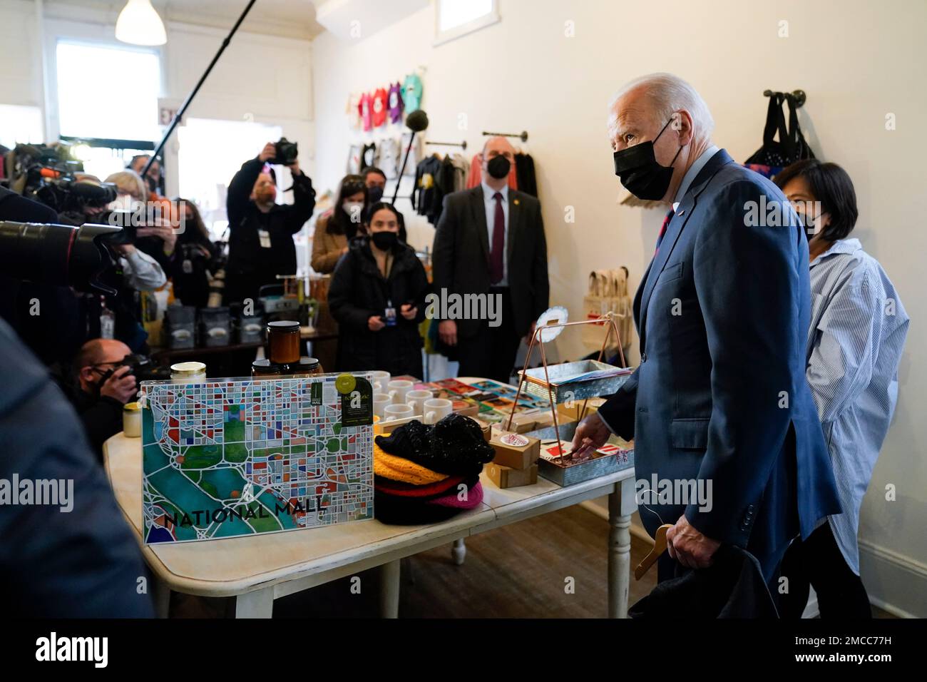 President Joe Biden visits the Honey Made store in Washington, Tuesday ...