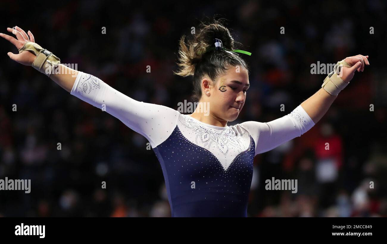 UC Davis's Kyla Kessler competes on the balance beam during an NCAA ...