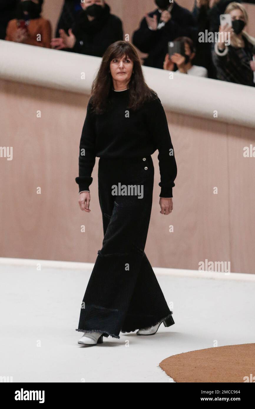 Virginie Viard accepts applause after the Chanel Spring-Summer