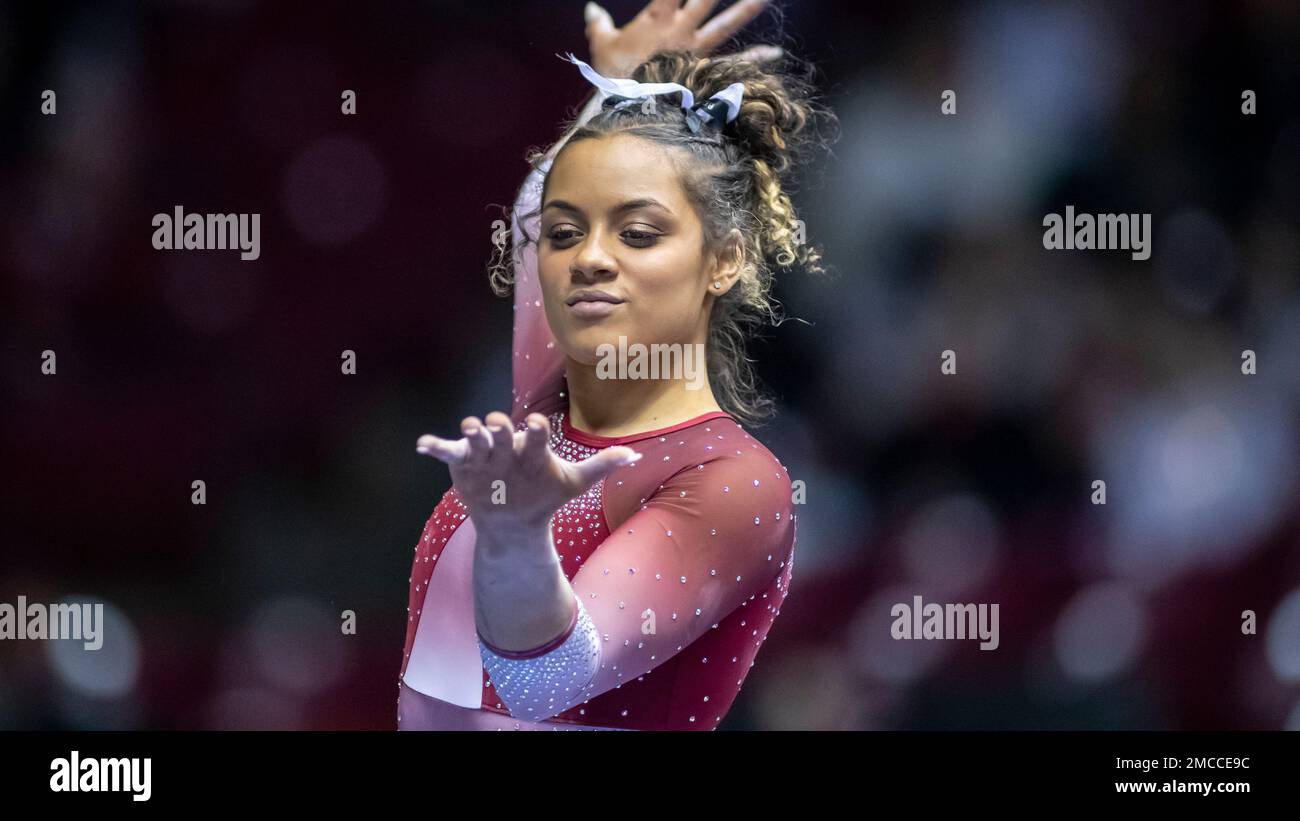 Alabama gymnast Makarri Doggette competes on the beam during an NCAA
