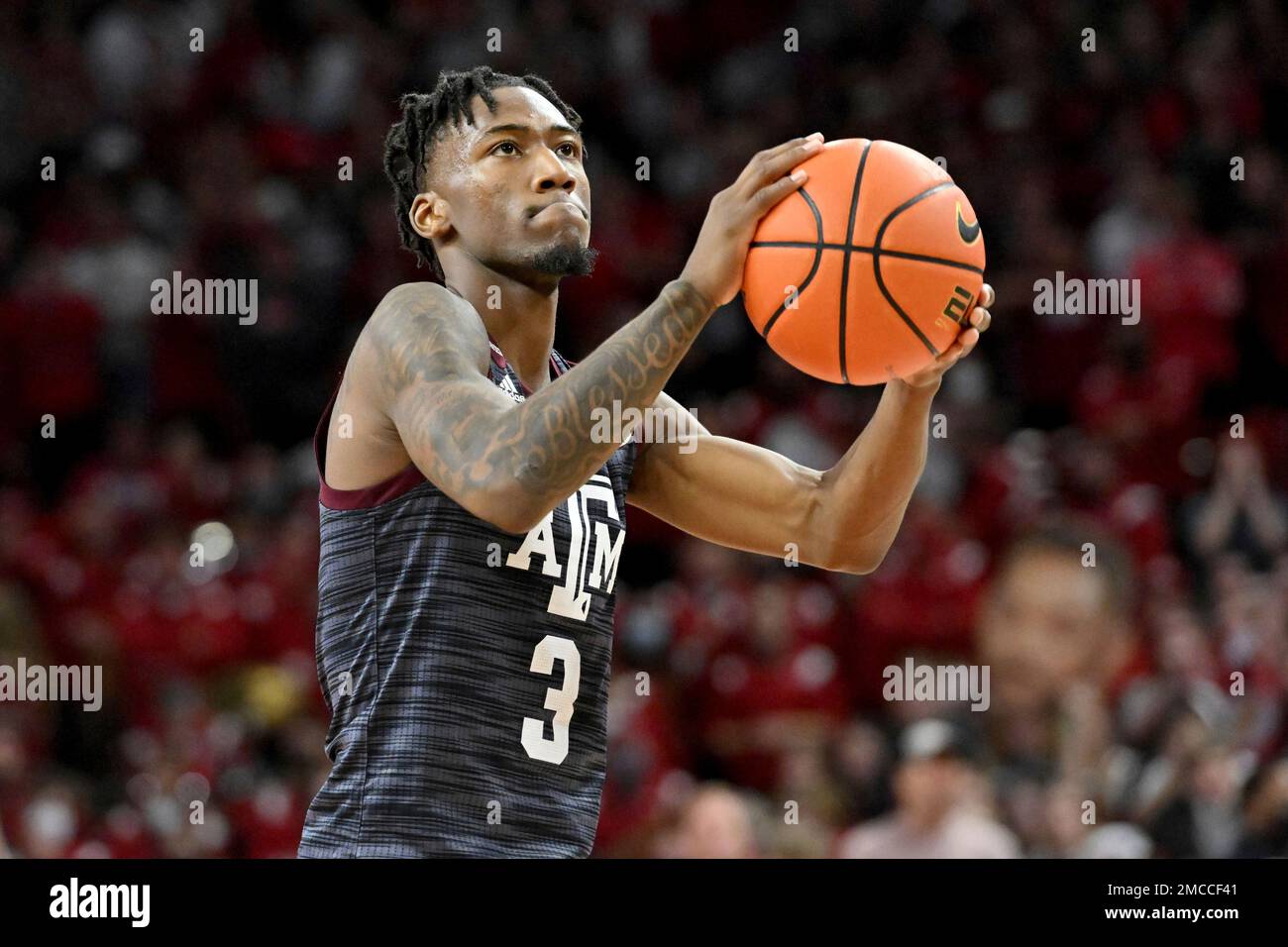 Texas A&M guard Quenton Jackson (3) shoots against Arkansas during an