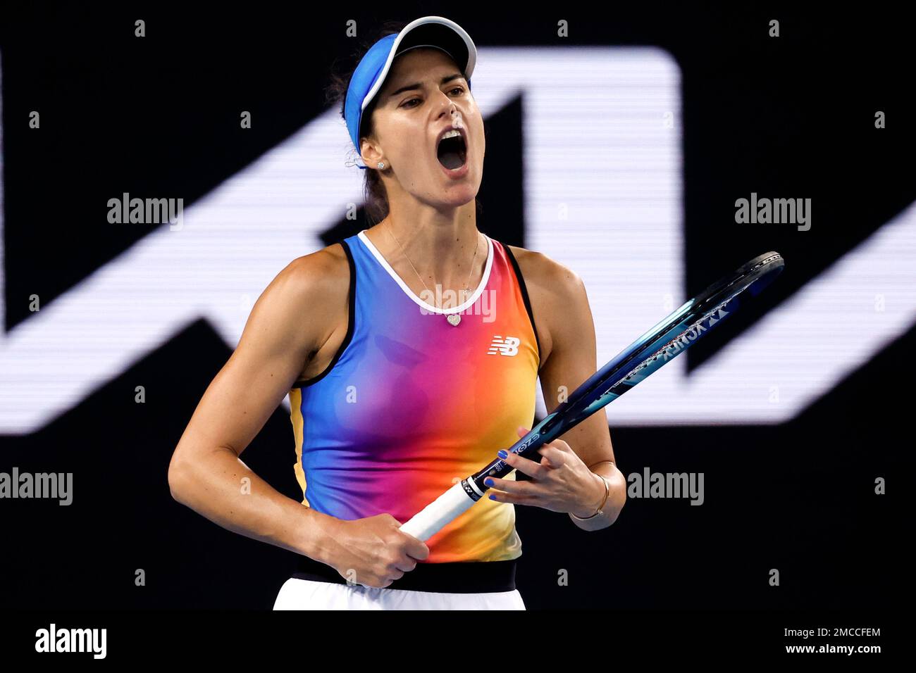 Sorana Cirstea of Romania reacts during her fourth round match against Iga Swiatek of Poland at the Australian Open tennis championships in Melbourne, Australia, Monday, Jan
