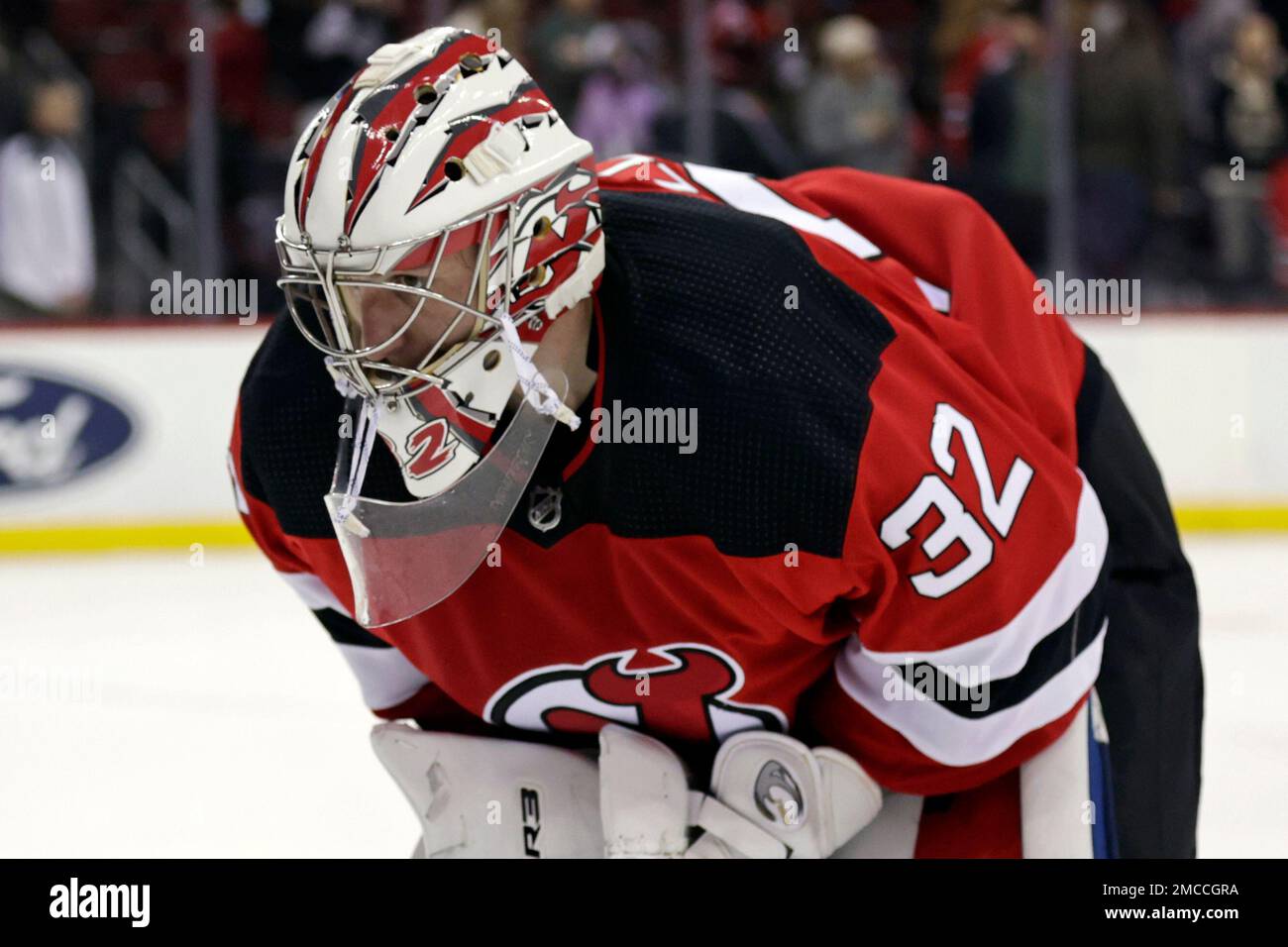 New Jersey Devils goaltender Jon Gillies (32) reacts skating off the